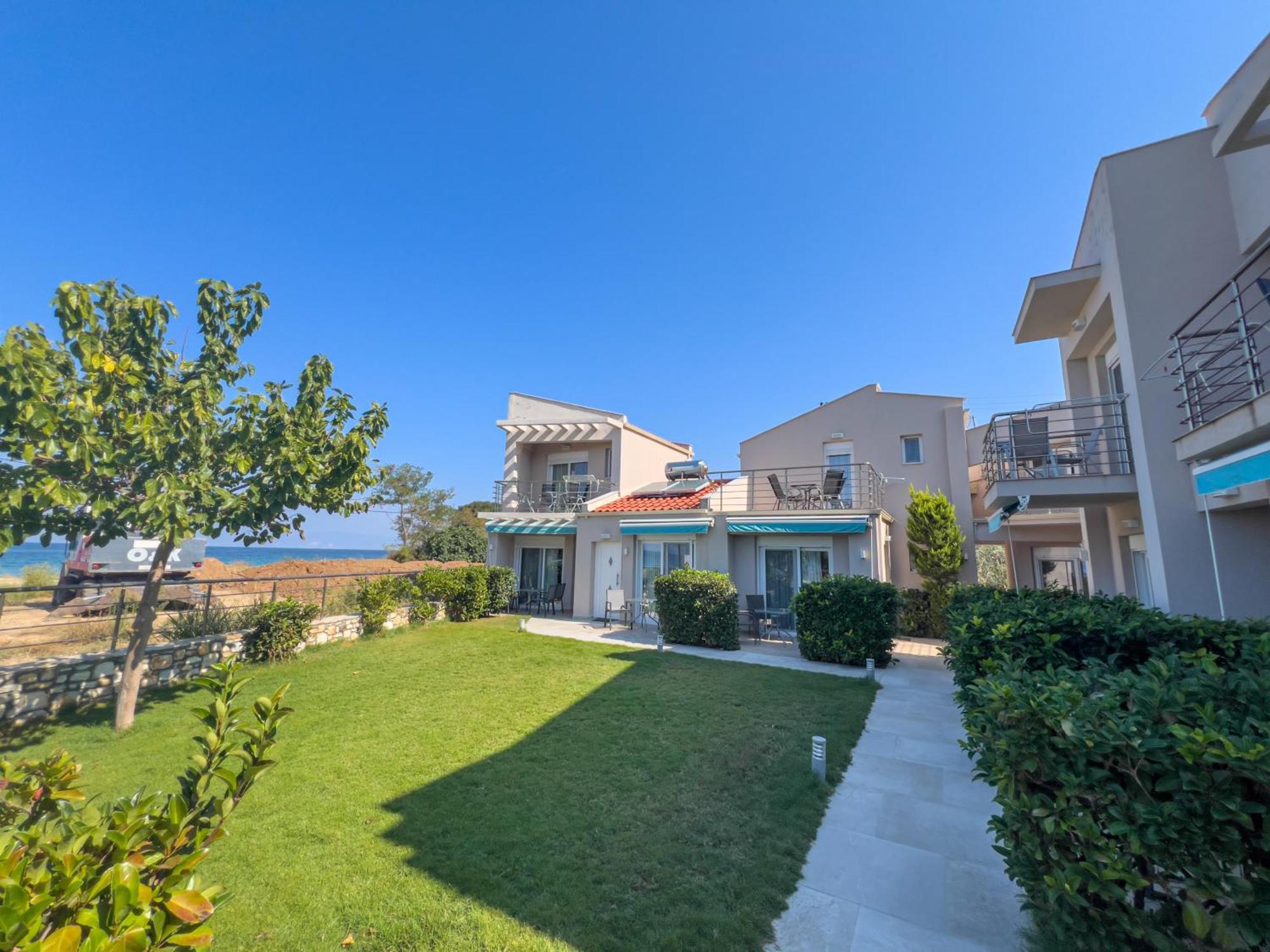 Yalos Beach Maisonettes Скала-Сотирос Экстерьер фото